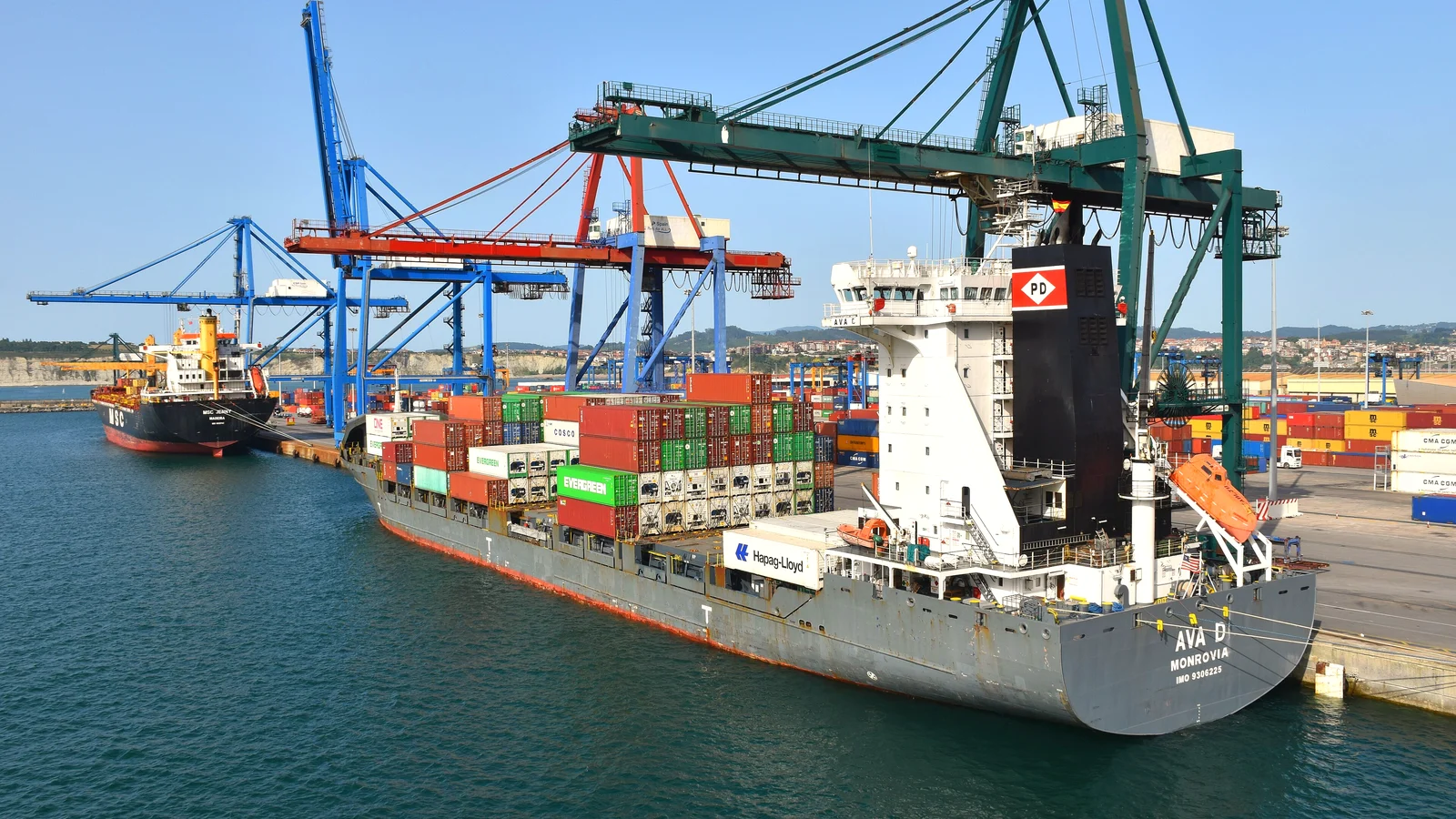 Container ship loading export cargo at the Bilbao container terminal