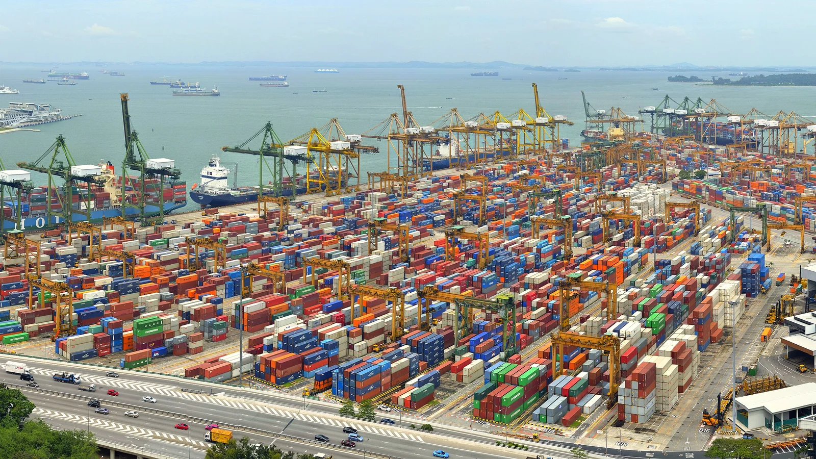 Aerial view of Keppel Container Terminal in Singapore with cranes and container yards